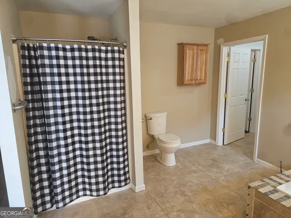 a bathroom with a toilet