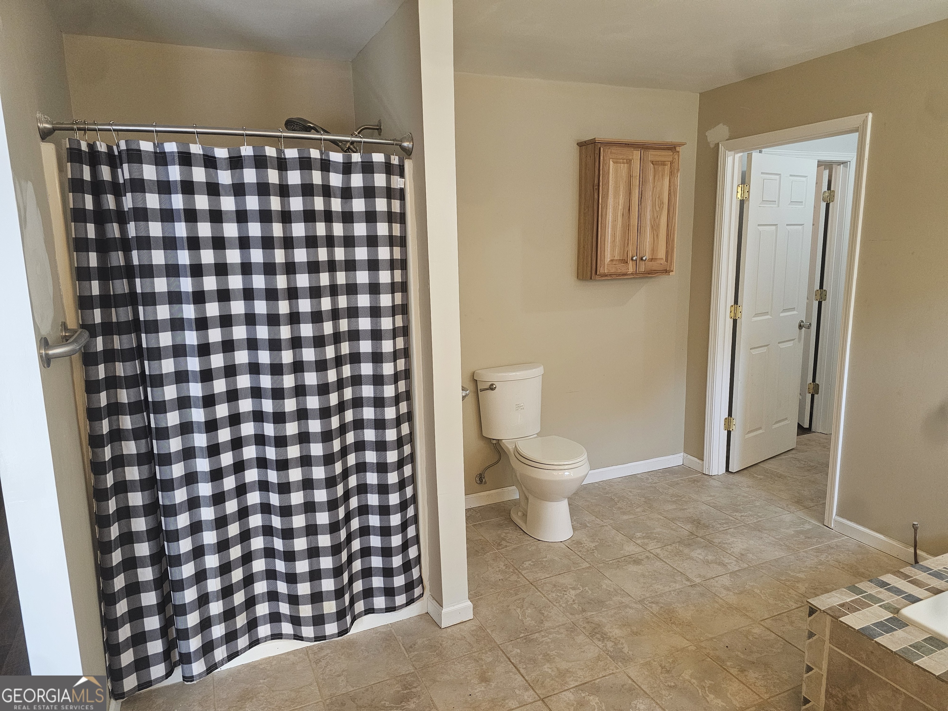 695 Frost Road Bowdon, GA 30108 - Photo 8 of 32 a bathroom with a toilet