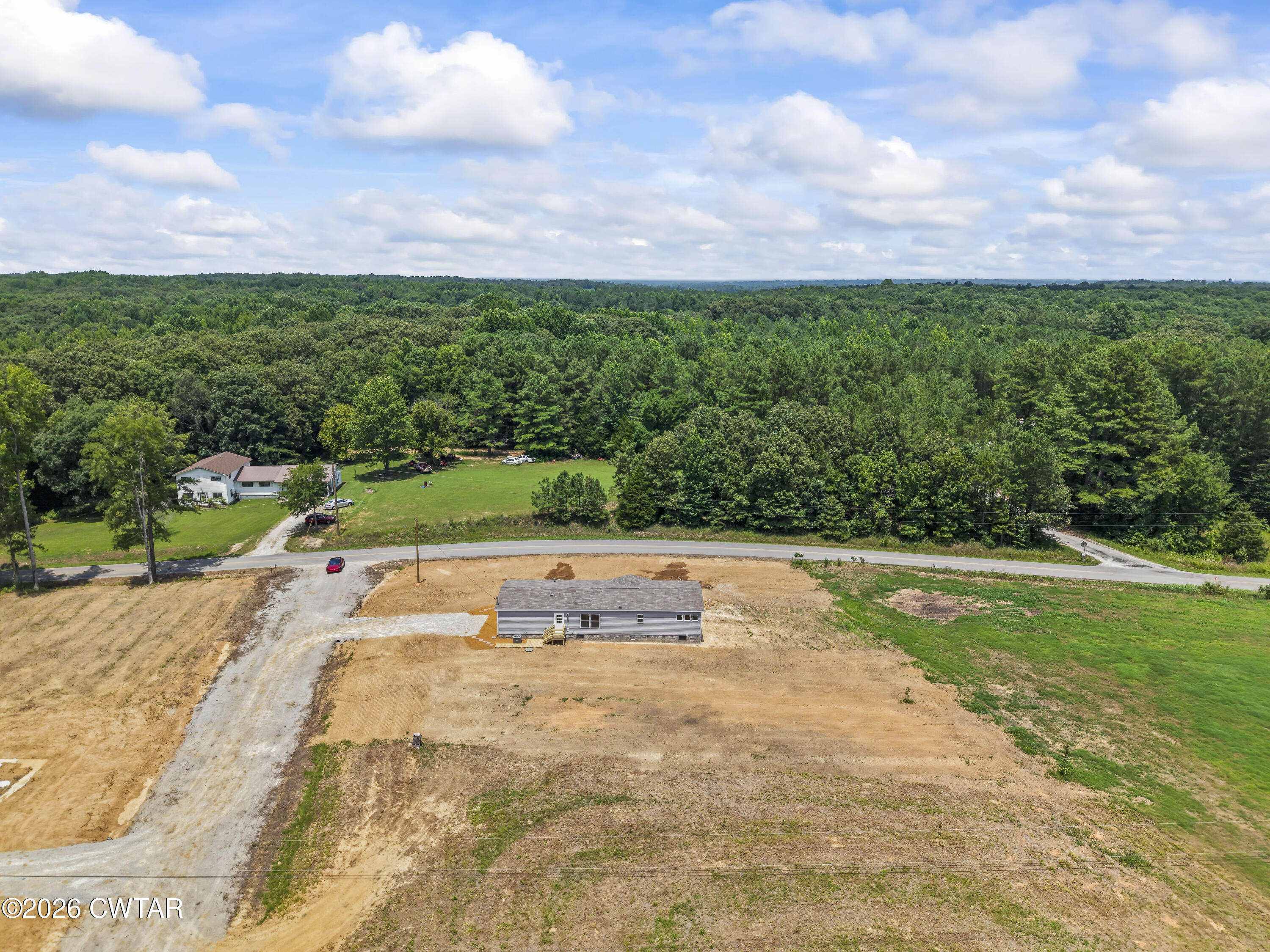 3045 Clifford Road Henderson, TN 38340 - Photo 27 of 28 DJI_20260703131701_0112_D