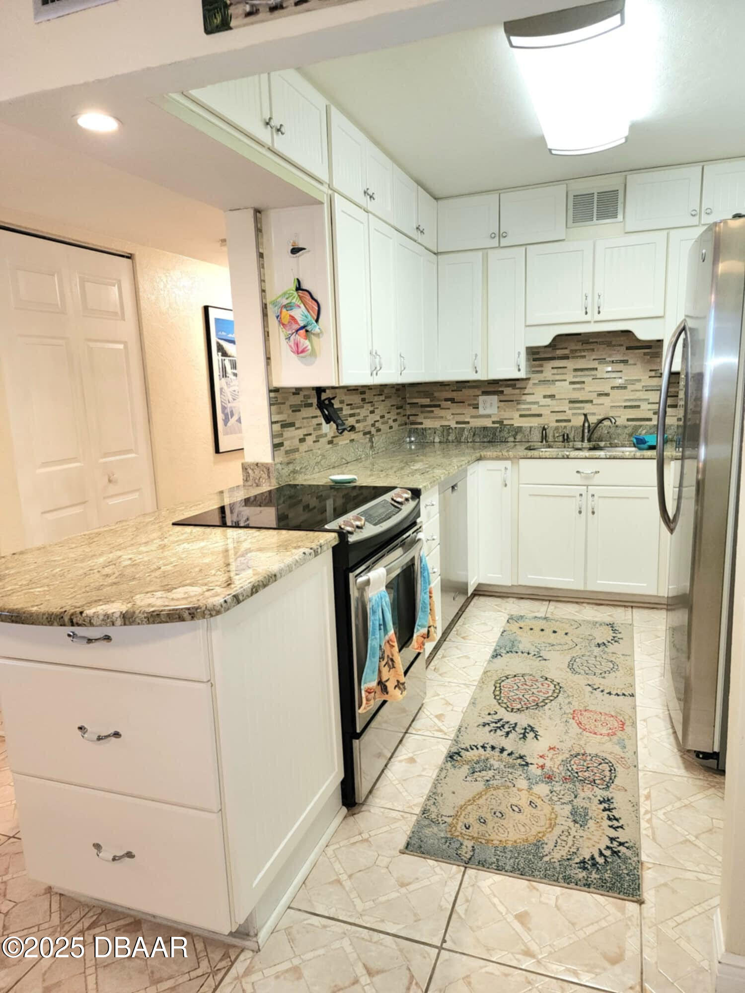 1415 Ocean Shore Boulevard, Unit 203 Ormond Beach, FL 32176 - Photo 5 of 20 203 Kitchen