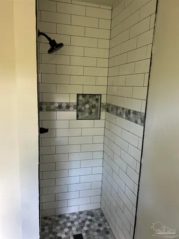 a kitchen with a window a sink and a cabinet