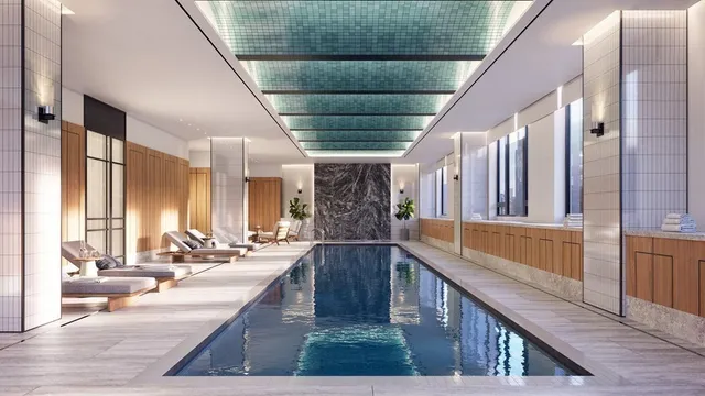 a view of swimming pool with outdoor seating