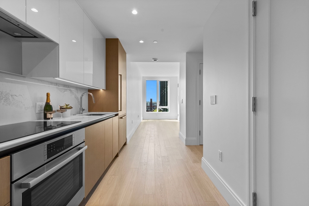 380 Harrison Avenue, Unit 1005 Boston, MA 02118 - Photo 5 of 14 a view of a kitchen with a sink and cabinets