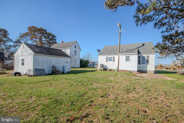 a house view with a backyard space
