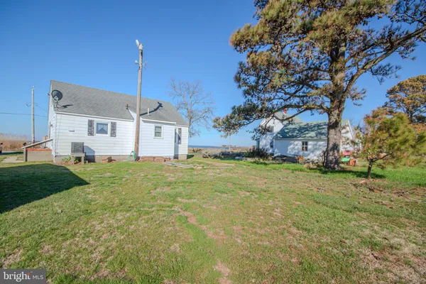 a bathroom with a sink and a yard