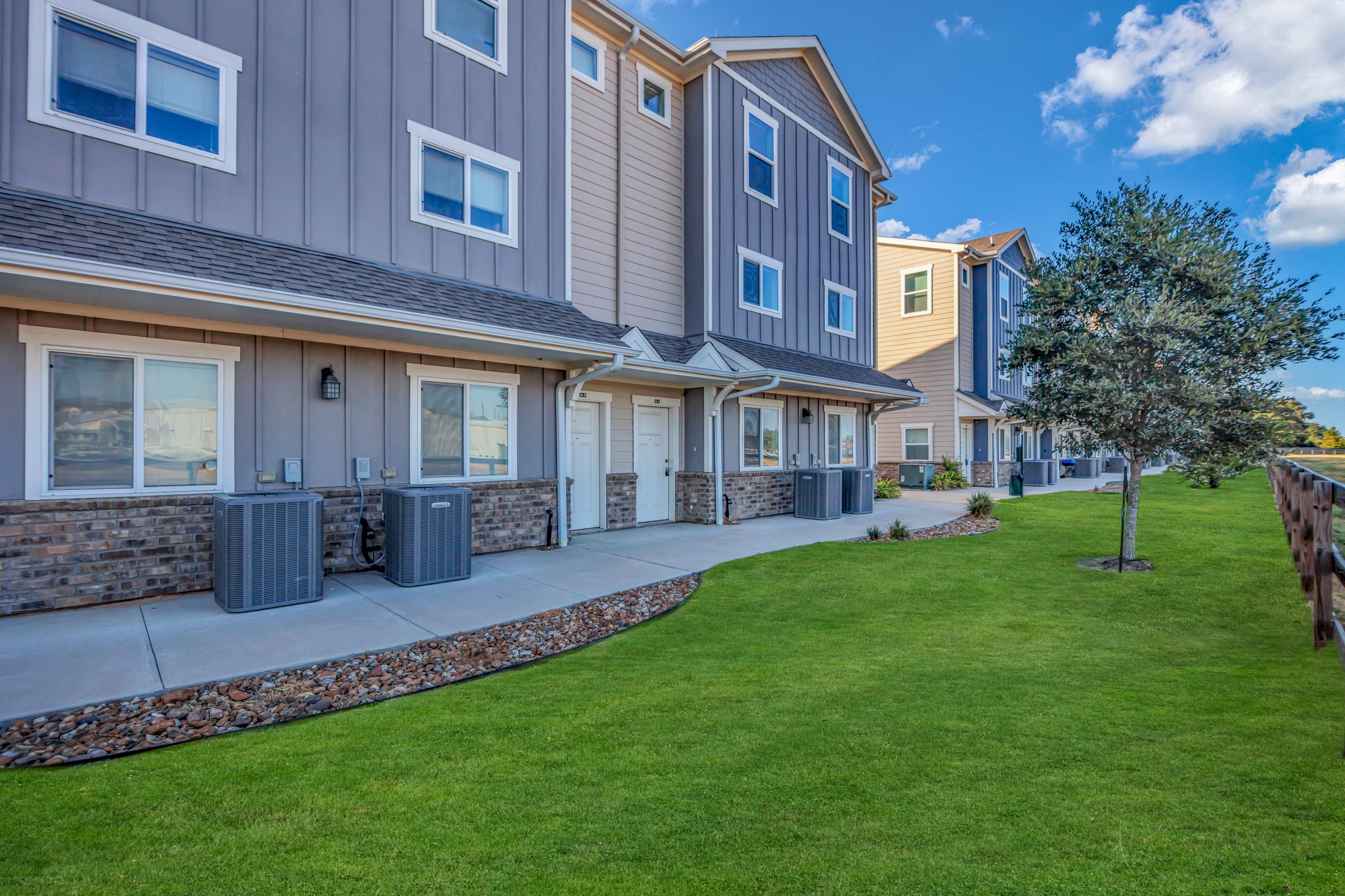21155 Gosling Road, Unit 16B Spring, TX 77388 - Photo 2 of 16 a view of a building with a yard