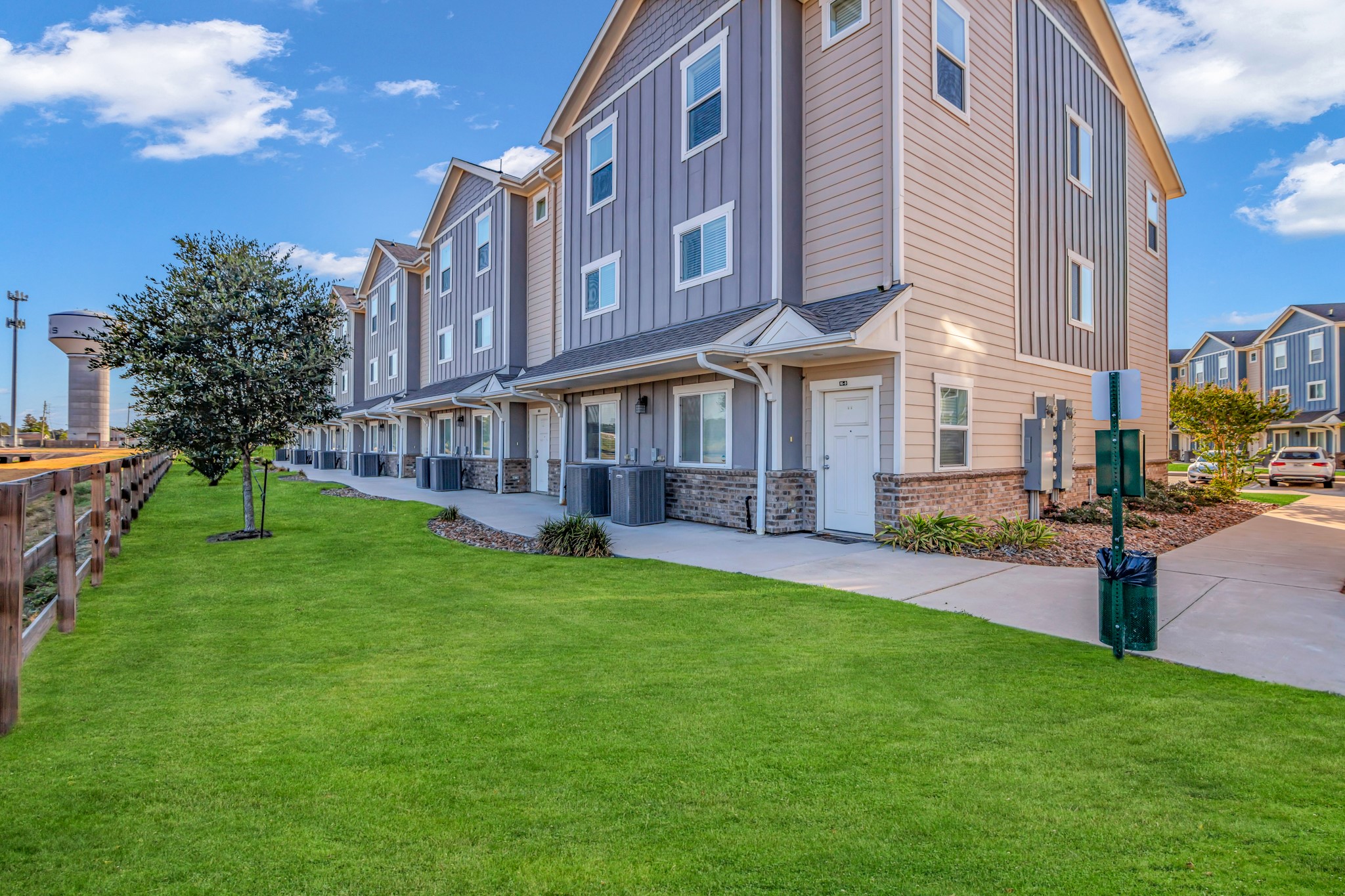 21155 Gosling Road, Unit 16B Spring, TX 77388 - Photo 3 of 16 a view of a building with a yard