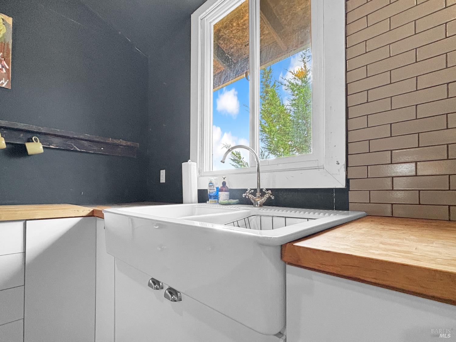 56801 Registered Guest Road Laytonville, CA 95454 - Photo 18 of 22 a bathroom with a sink and a large mirror