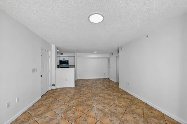 an aerial view of a houses with yard