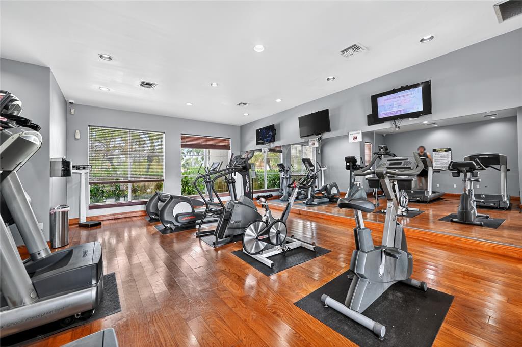 2011 Renaissance Boulevard, Unit 101 Miramar, FL 33025 - Photo 10 of 32 a view of a room with gym equipment
