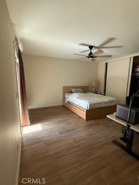 14172 Raintree Road Tustin, CA 92780 - Photo 11 of 27 a bedroom with a bed and furniture