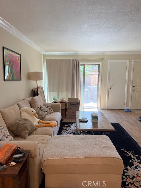 14172 Raintree Road Tustin, CA 92780 - Photo 15 of 27 a living room with a bed and a window