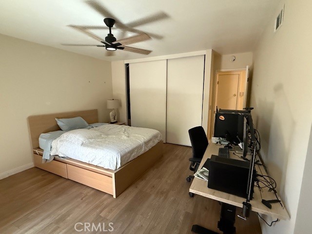 14172 Raintree Road Tustin, CA 92780 - Photo 18 of 27 a bedroom with a bed and a window