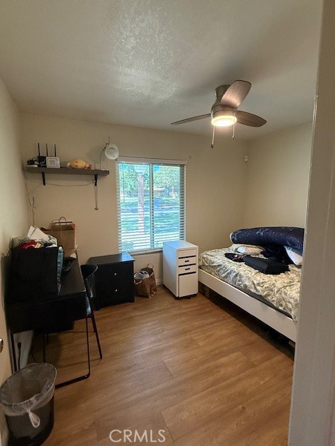 14172 Raintree Road Tustin, CA 92780 - Photo 3 of 27 a bedroom with furniture and a window