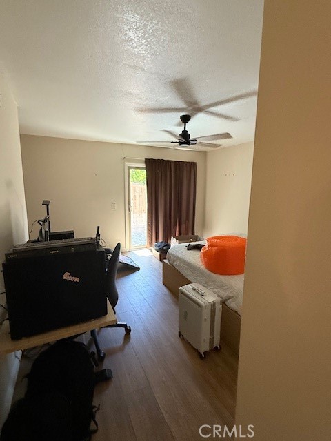14172 Raintree Road Tustin, CA 92780 - Photo 6 of 27 a living room with furniture and a window