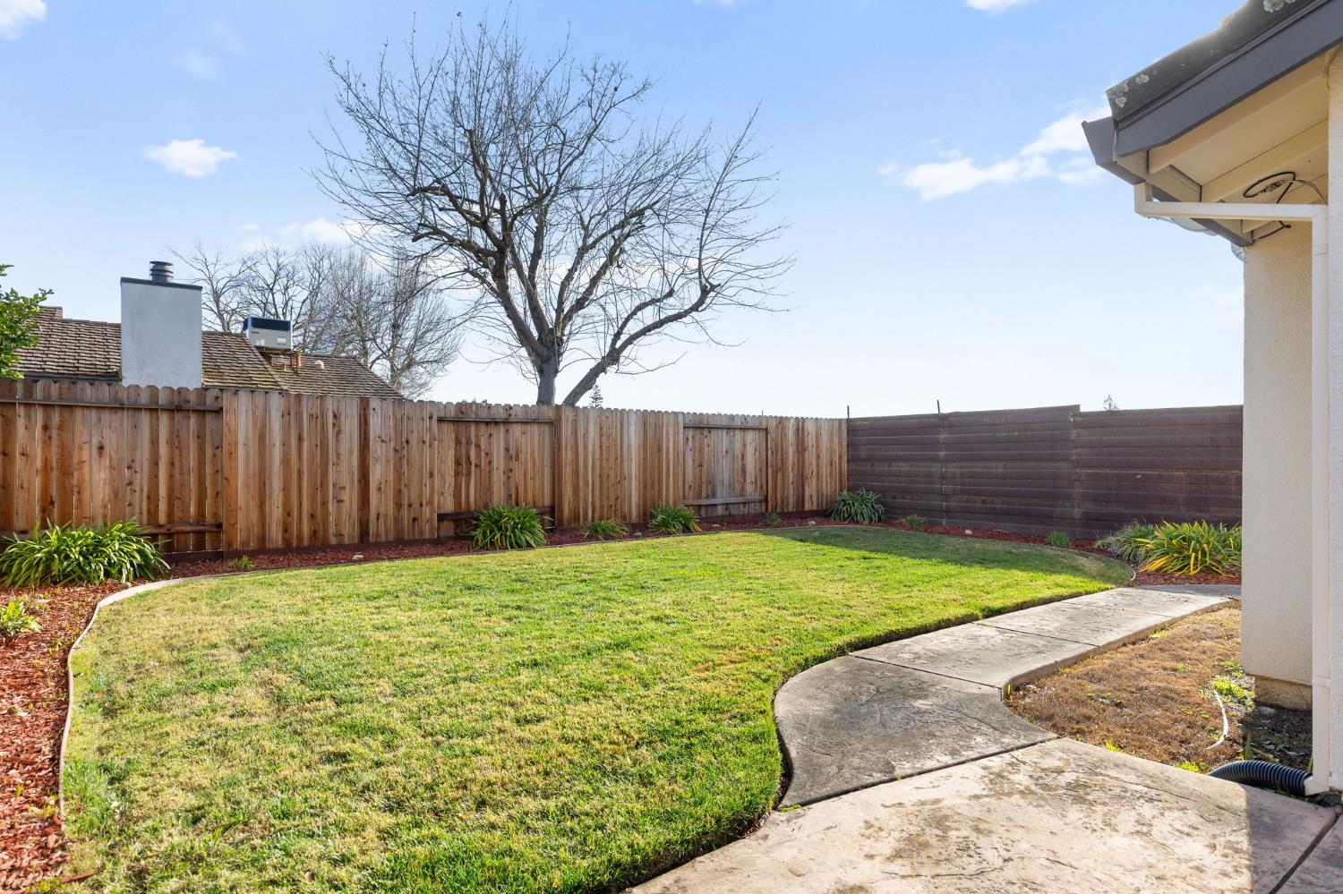 10938 Anza Way Rancho Cordova, CA 95670 - Photo 26 of 37 a view of outdoor space and yard