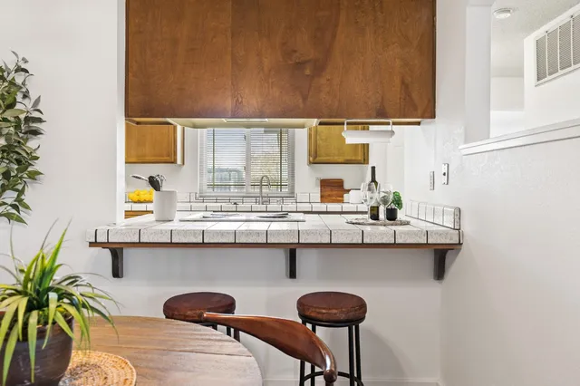 a kitchen with a sink and a cabinets