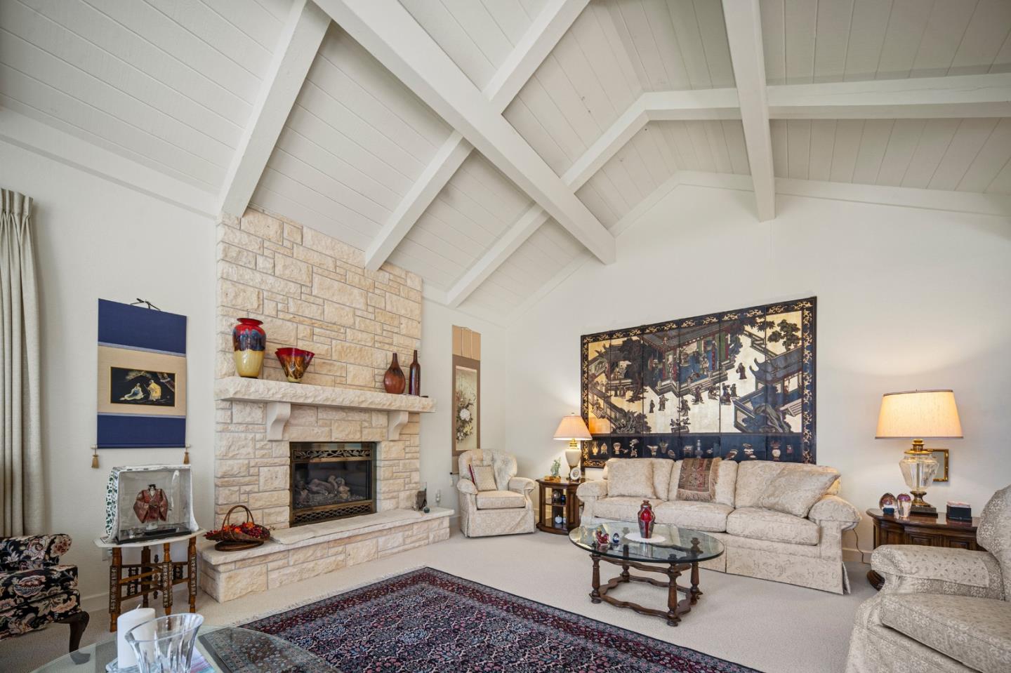 2911 Colton Road Pebble Beach, CA 93953 - Photo 8 of 46 a living room with furniture and a fireplace