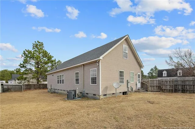 a house with trees in front of it