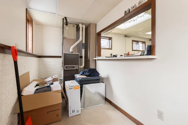 a view of a workspace with furniture