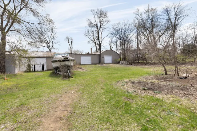 a view of a backyard of the house