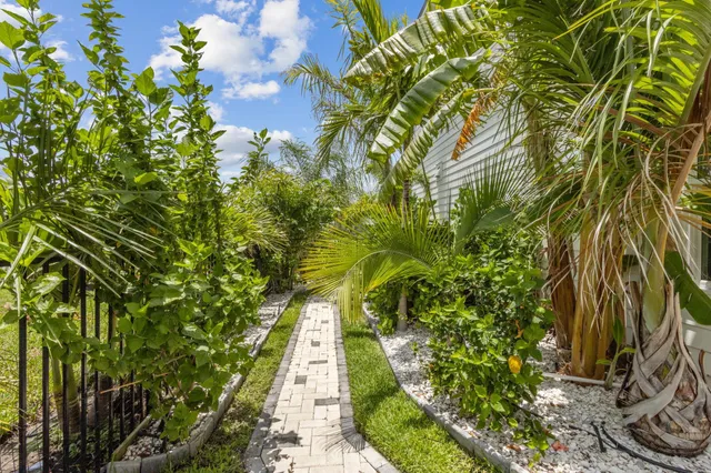 a view of a swimming pool with a lounge chairs