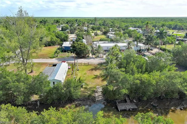 an aerial view of residential house with outdoor space