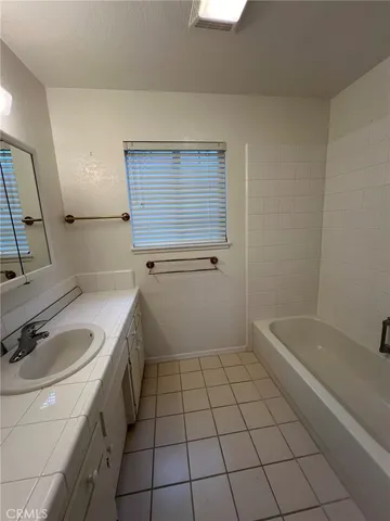 a room with a window and gym equipment