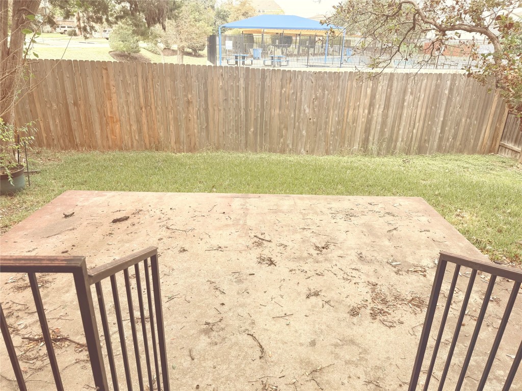 2438 Falcon Drive Round Rock, TX 78681 - Photo 17 of 18 a view of wooden fence