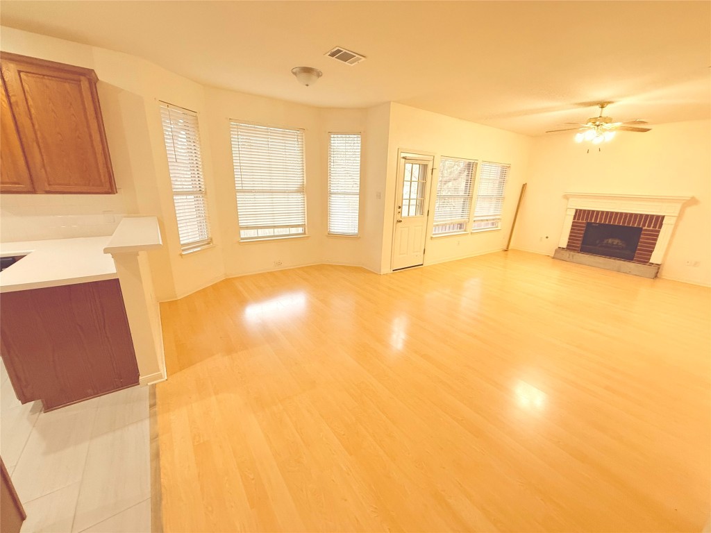 2438 Falcon Drive Round Rock, TX 78681 - Photo 7 of 18 a view of an empty room with a window