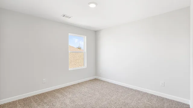 an empty room with a window