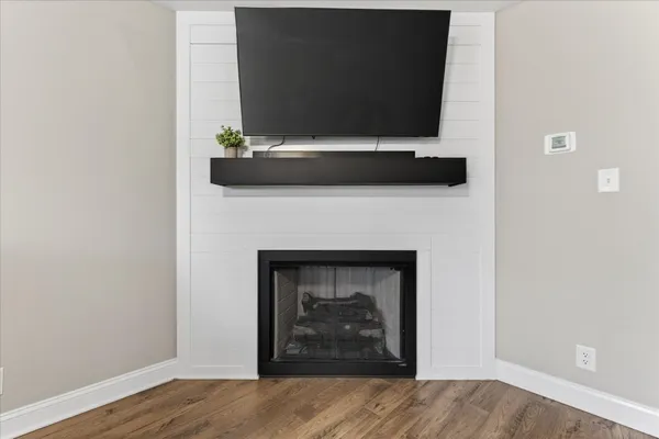 a living room with a fireplace