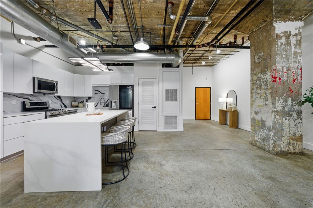 505 Whitehall Street Southwest, Unit 102 Atlanta, GA 30303 - Photo 11 of 46 a room with storage and utility