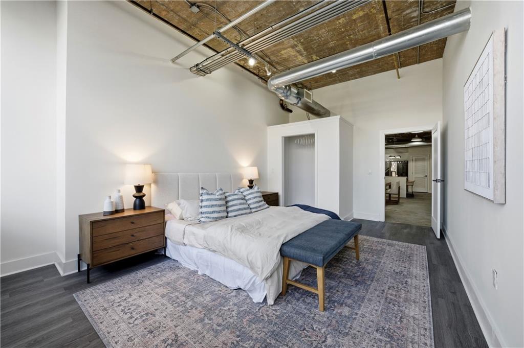 505 Whitehall Street Southwest, Unit 102 Atlanta, GA 30303 - Photo 21 of 46 a bedroom with a bed and a table