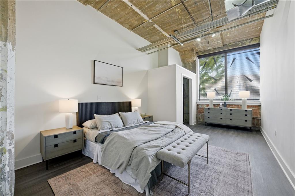 505 Whitehall Street Southwest, Unit 102 Atlanta, GA 30303 - Photo 24 of 46 a bedroom with bed and window
