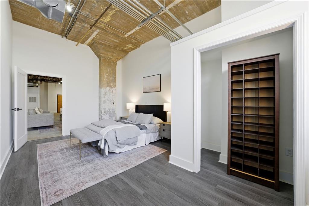 505 Whitehall Street Southwest, Unit 102 Atlanta, GA 30303 - Photo 27 of 46 a bed room with a bed and a window