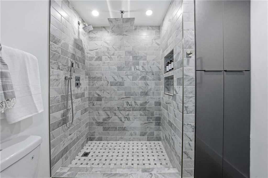 505 Whitehall Street Southwest, Unit 102 Atlanta, GA 30303 - Photo 31 of 46 a bathroom with a shower