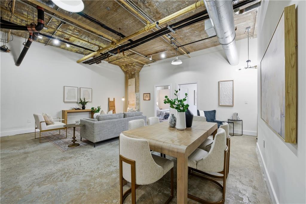 505 Whitehall Street Southwest, Unit 102 Atlanta, GA 30303 - Photo 4 of 46 a view of a dining room with furniture