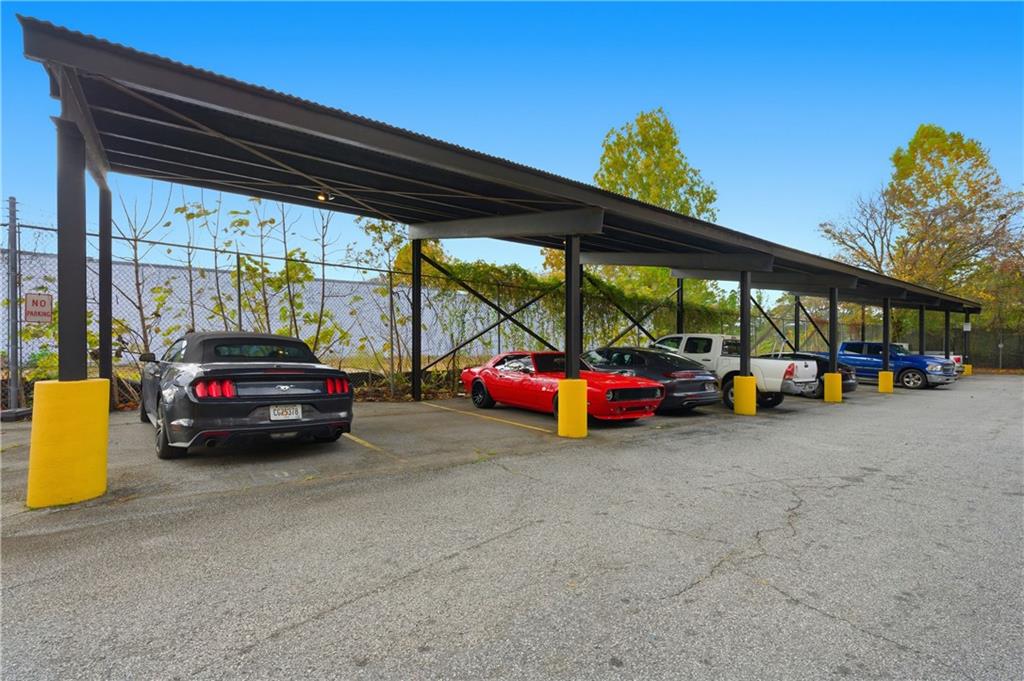 505 Whitehall Street Southwest, Unit 102 Atlanta, GA 30303 - Photo 41 of 46 a view of cars parked in front of a building