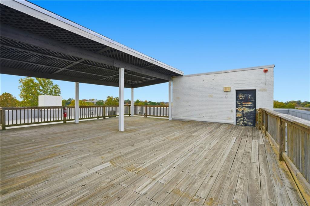 505 Whitehall Street Southwest, Unit 102 Atlanta, GA 30303 - Photo 44 of 46 a view of a balcony with wooden floor