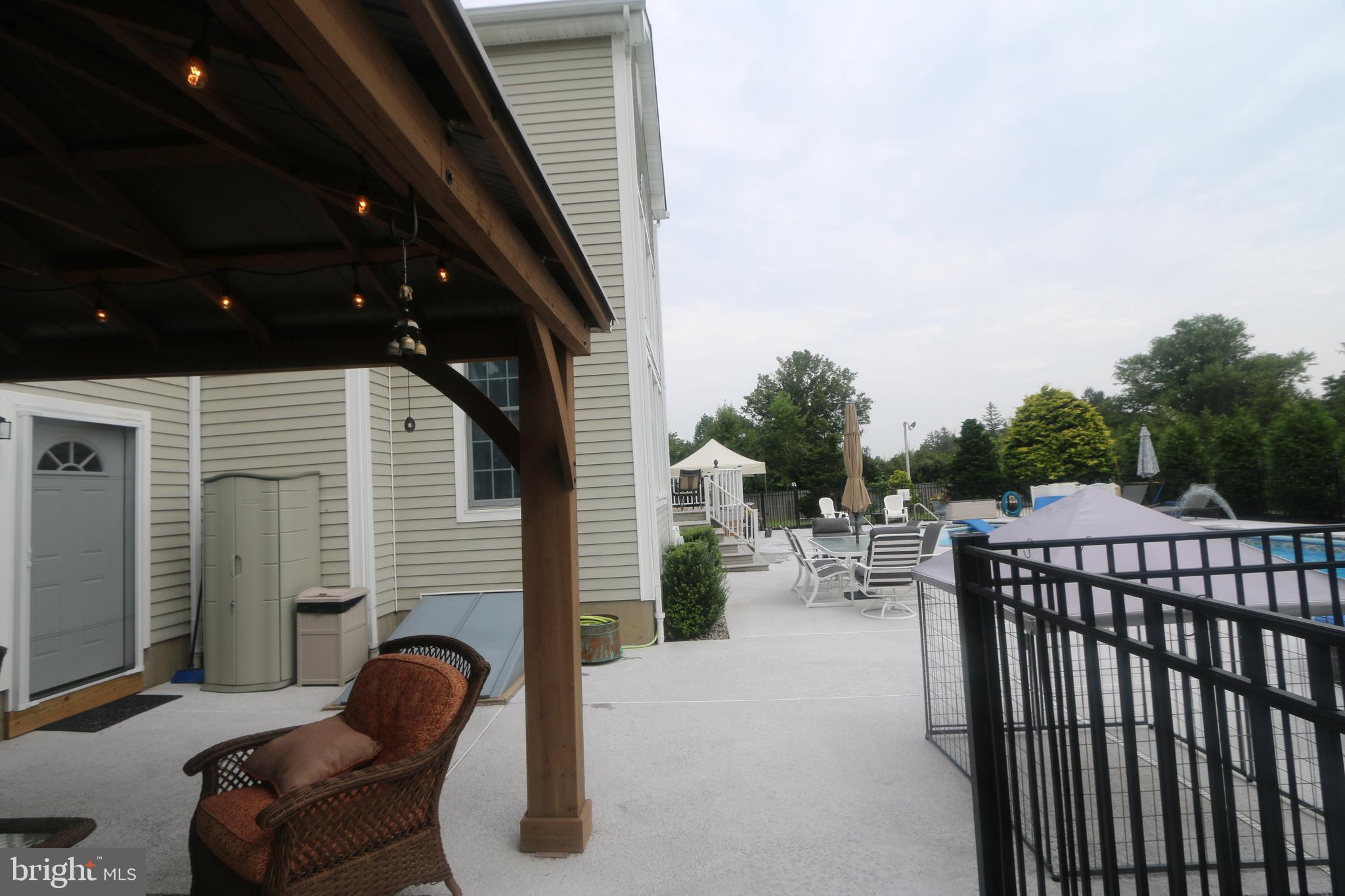 203 Holmes Mill Road Cream Ridge, NJ 08514 - Photo 44 of 58 View of pool area from cabana