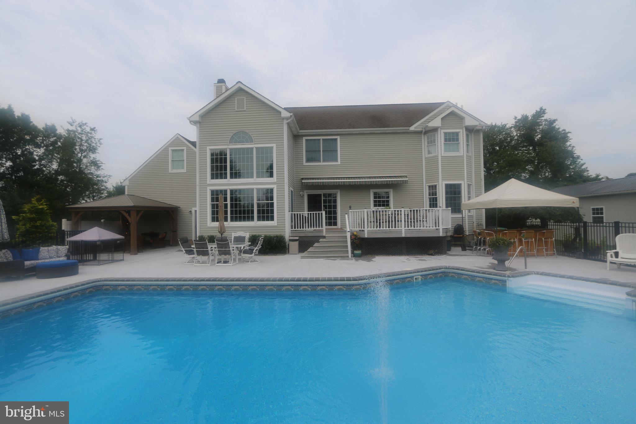 203 Holmes Mill Road Cream Ridge, NJ 08514 - Photo 49 of 58 Another view pool/rear house/trex deck