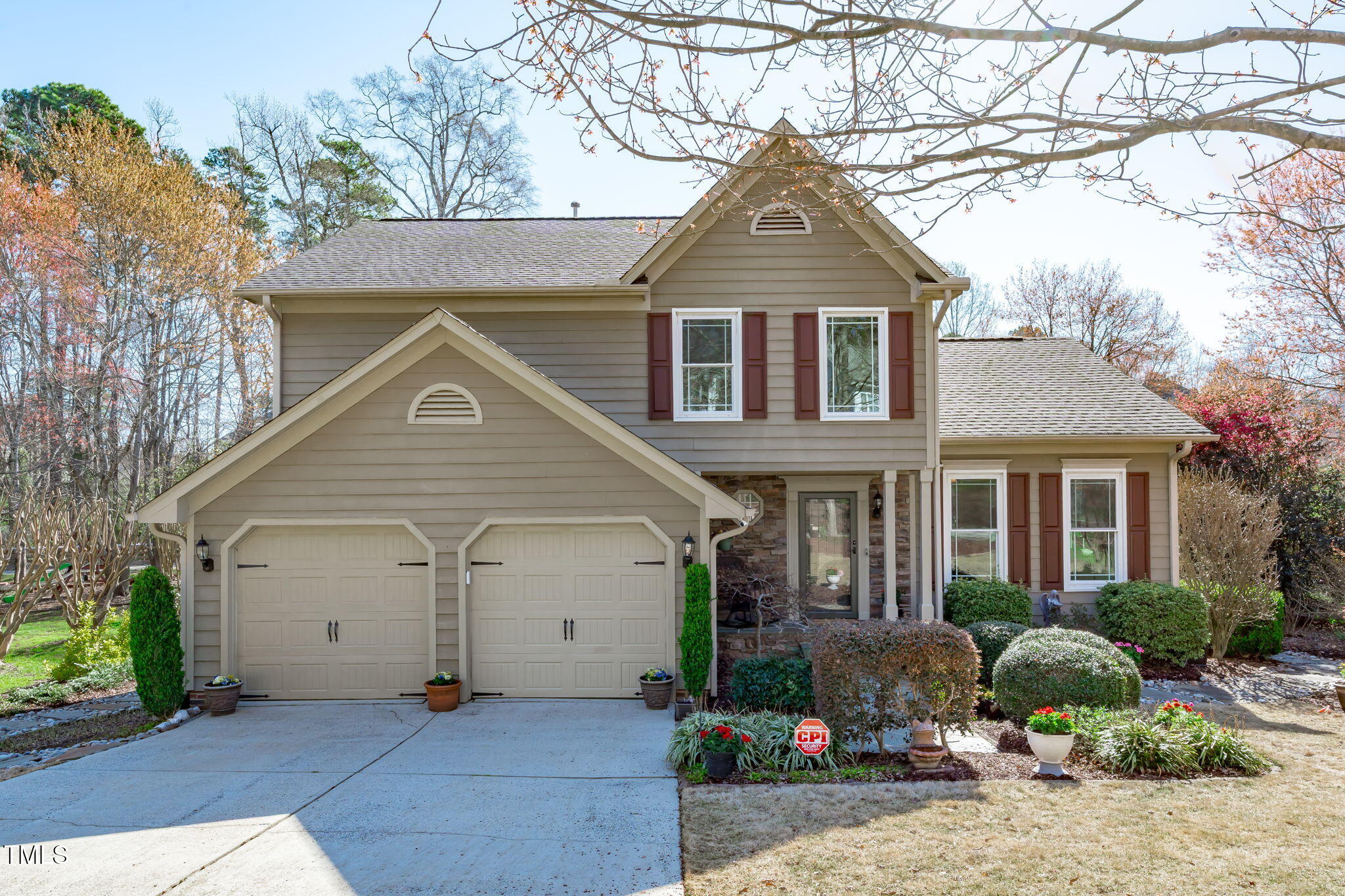 109 Covington Square Drive Cary, NC 27513 - Photo 1 of 41 a front view of a house with a yard and garage