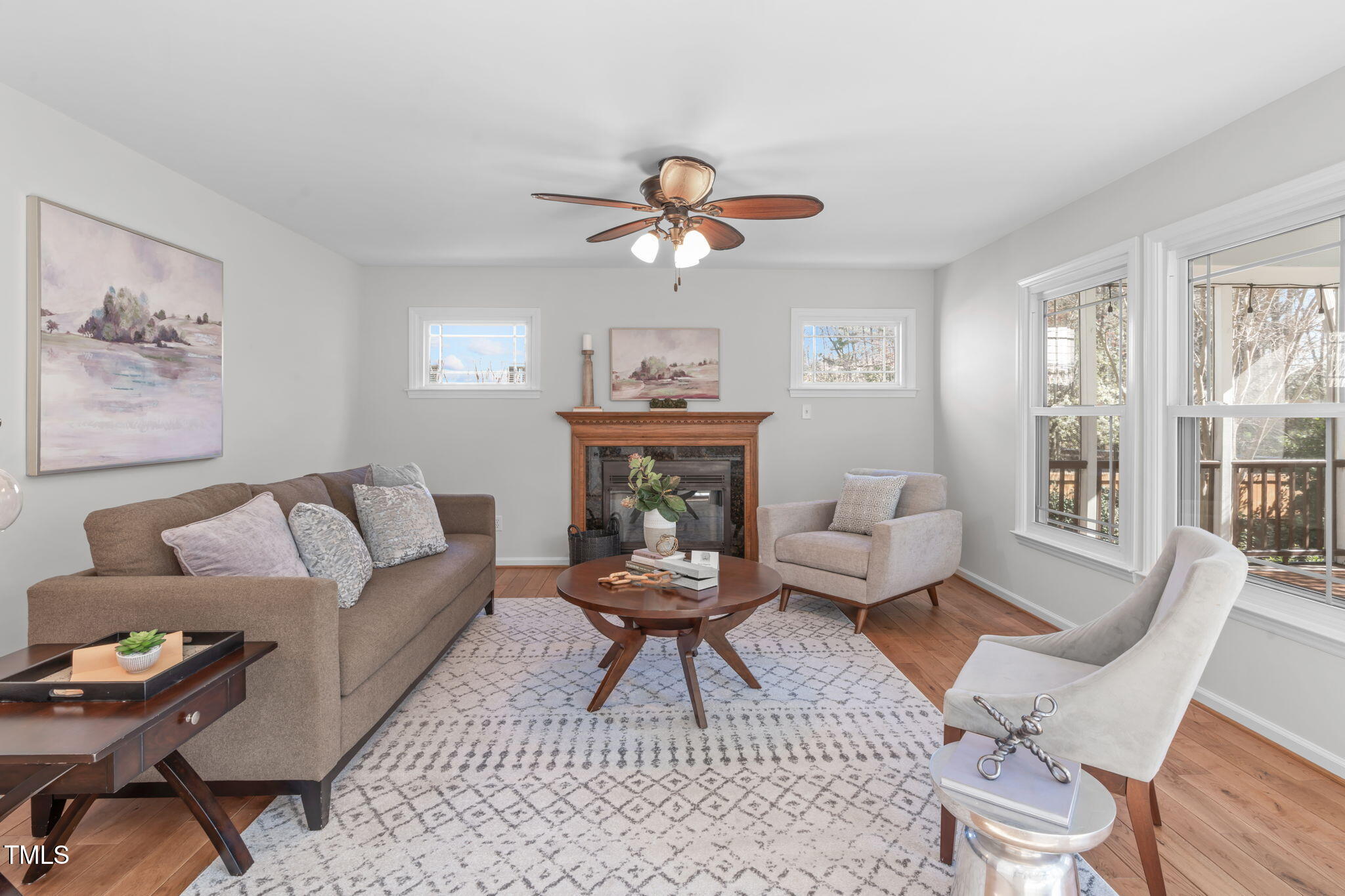 109 Covington Square Drive Cary, NC 27513 - Photo 13 of 41 a living room with furniture a bed and a chandelier