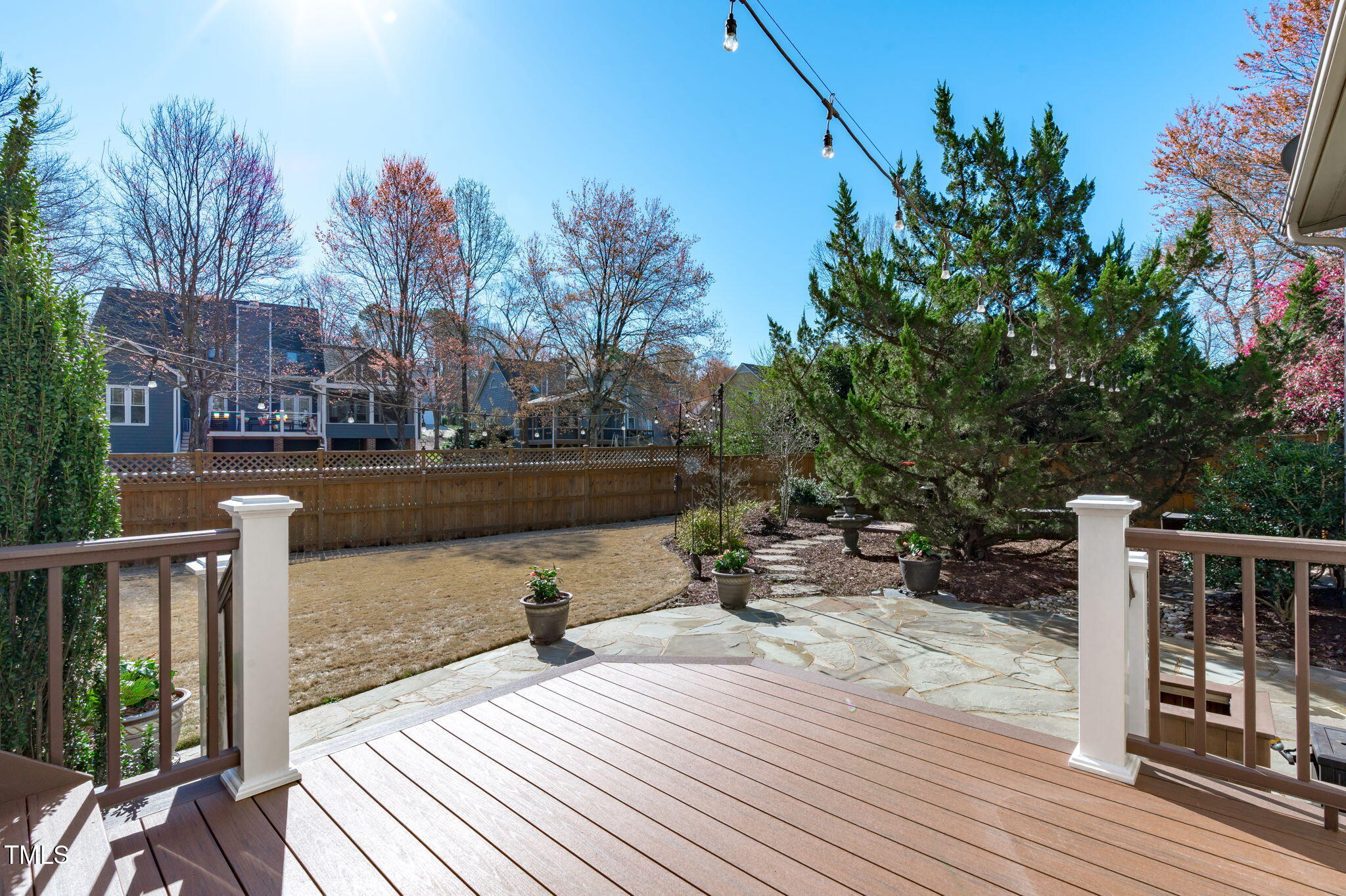 109 Covington Square Drive Cary, NC 27513 - Photo 28 of 41 a view of a deck with chairs next to a yard