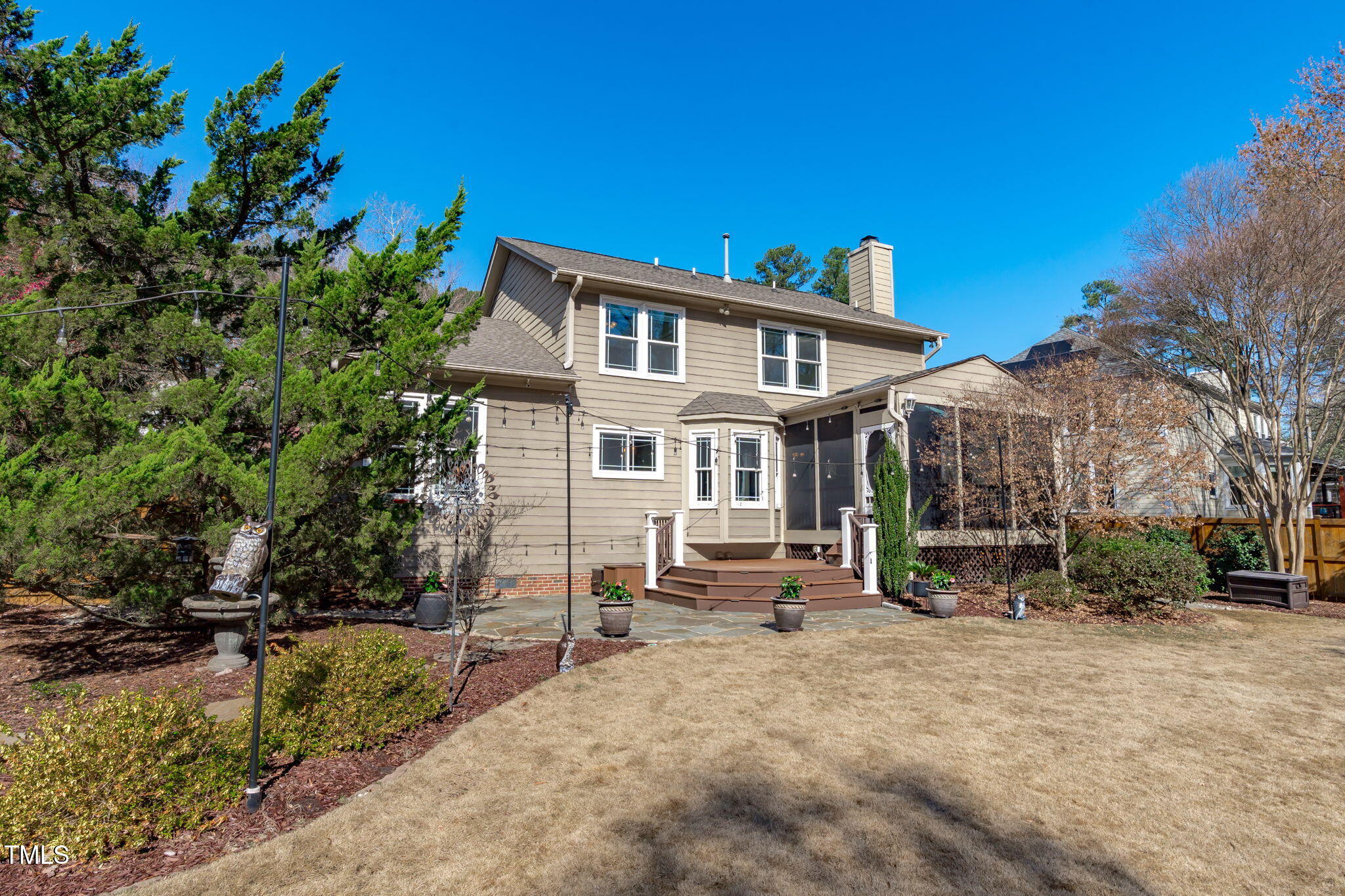 109 Covington Square Drive Cary, NC 27513 - Photo 32 of 41 a view of a house with a yard