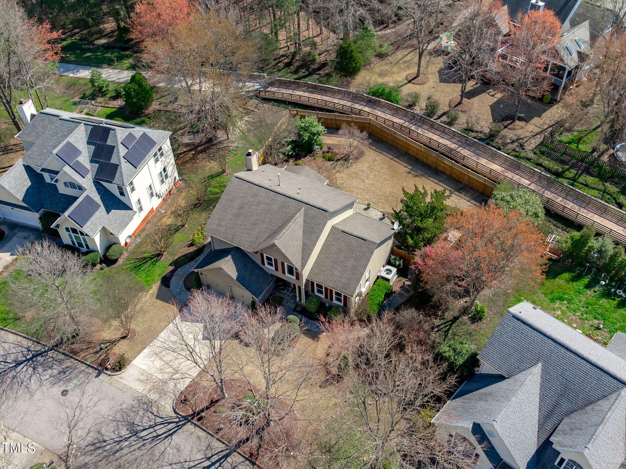 109 Covington Square Drive Cary, NC 27513 - Photo 36 of 41 an aerial view of a house with a yard and lake