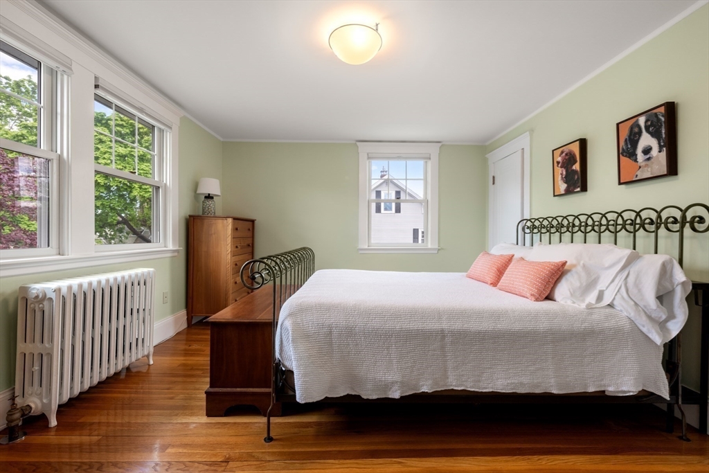 8 Charlotte Road Marblehead, MA 01945 - Photo 19 of 37 a bedroom with a bed and a window