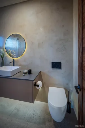 a bathroom with a sink and mirror