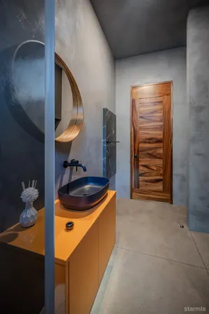 a kitchen with a sink and a stove